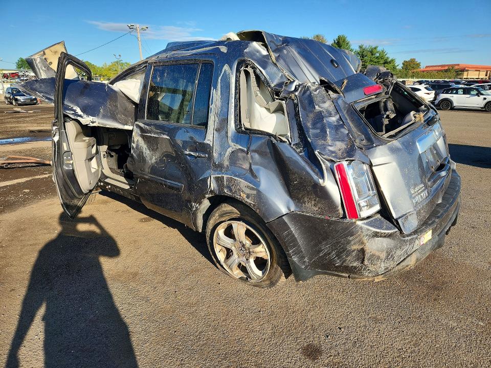 Photo 2 from auction – 2013 HONDA PILOT with VIN 5FNYF4H52DB038197