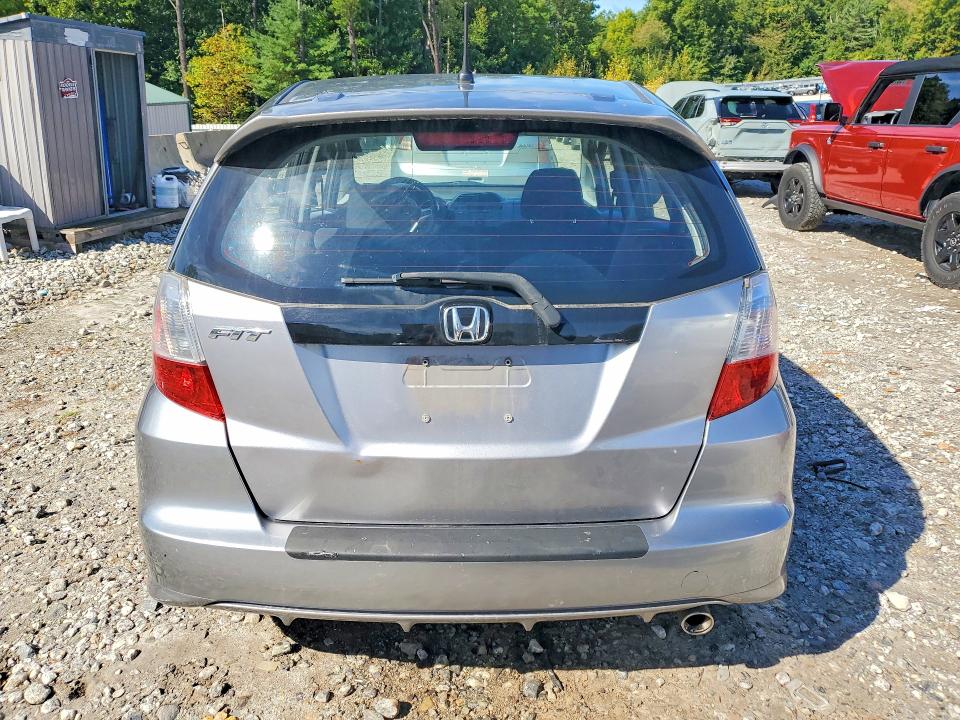 Снимка 6 от търг – 2009 HONDA FIT с VIN JHMGE88419S054400