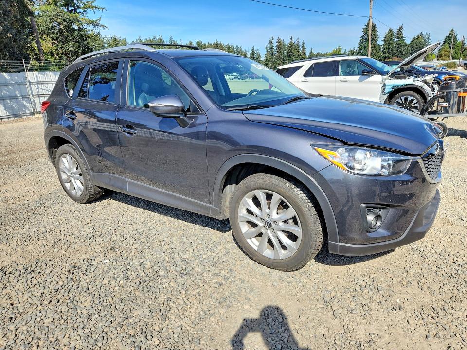 Photo 4 from auction – 2015 MAZDA CX-5 with VIN JM3KE4DYXF0532826