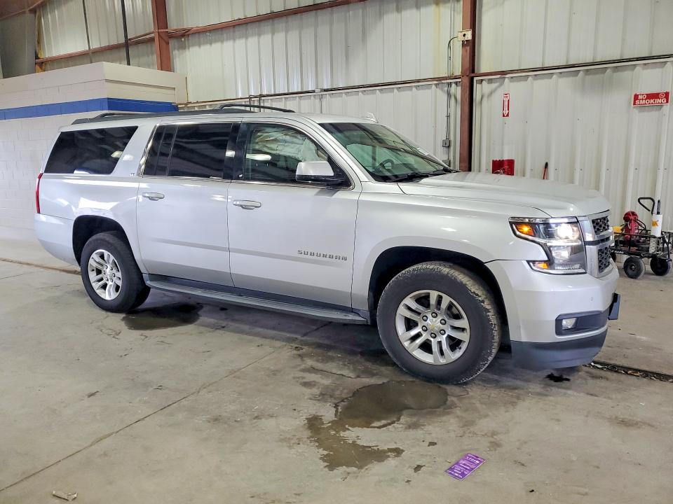 Photo 4 from auction – 2015 CHEVROLET SUBURBAN with VIN 1GNSKJKC5FR661857