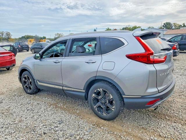 Photo 2 from auction – 2018 HONDA CR-V with VIN 7FARW2H98JE019939