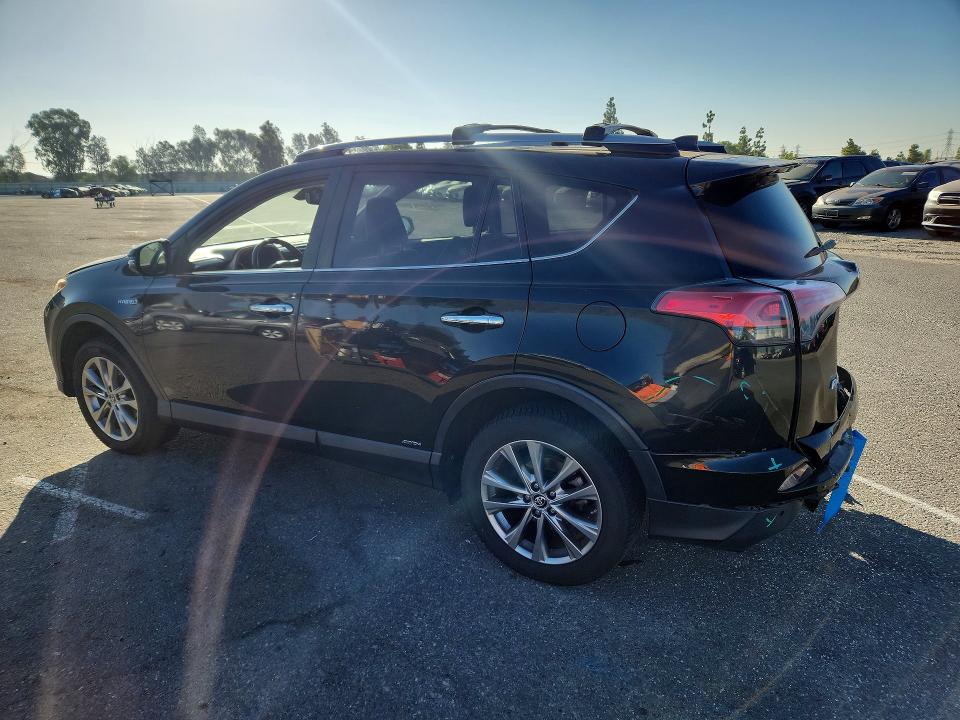 Photo 2 from auction – 2018 TOYOTA RAV4 HV with VIN JTMDJREV4JD164014
