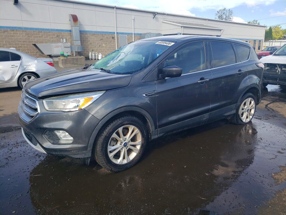FORD ESCAPE 2017 with VIN 1FMCU0G90HUE16555 - Photo from auction