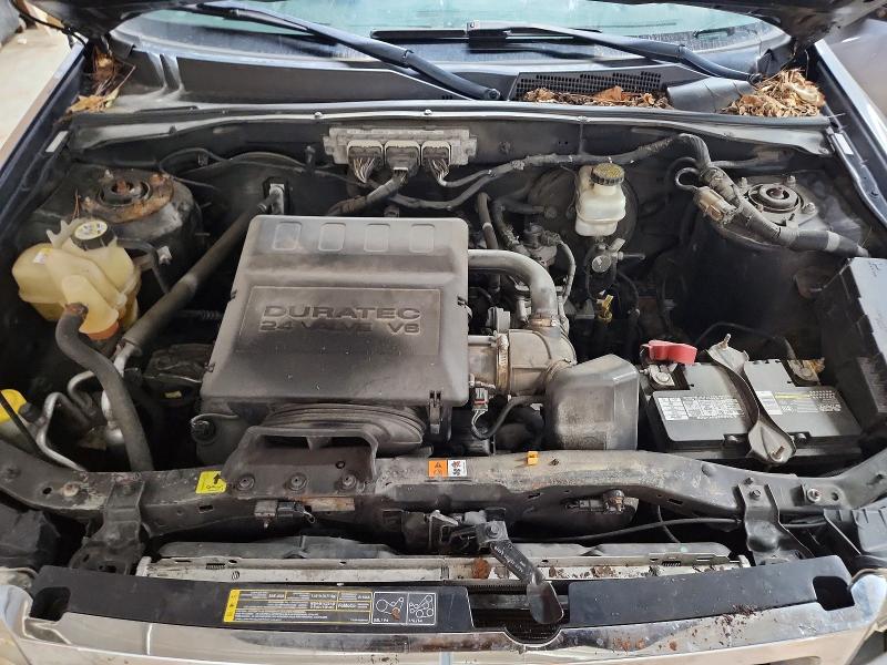 Снимка 12 от търг – 2009 FORD ESCAPE с VIN 1FMCU03G89KB02525