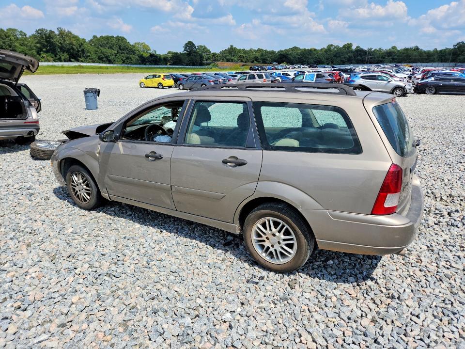 Photo 2 from auction – 2004 FORD FOCUS with VIN 1FAFP35Z64W104063