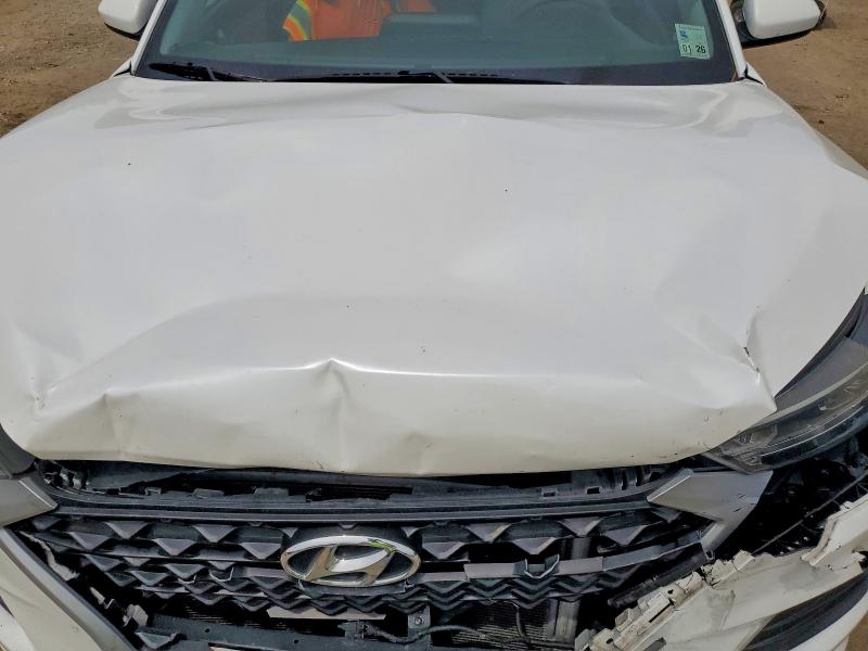 Снимка 12 от търг – 2021 HYUNDAI TUCSON с VIN KM8J23A42MU392314