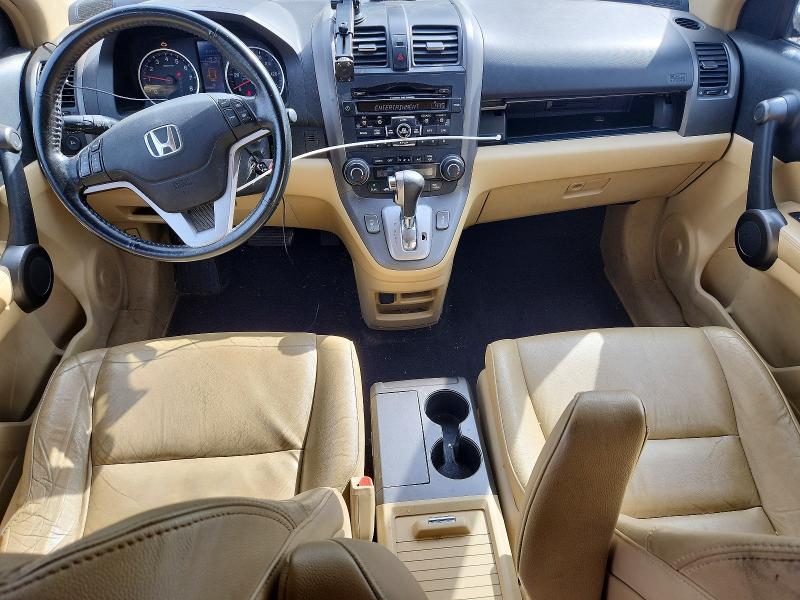 Photo 8 from auction – 2011 HONDA CR-V with VIN 5J6RE4H77BL818001