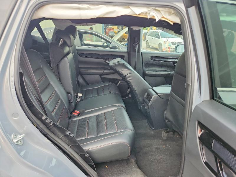 Photo 11 from auction – 2024 HONDA CR-V with VIN 2HKRS6H97RH203524