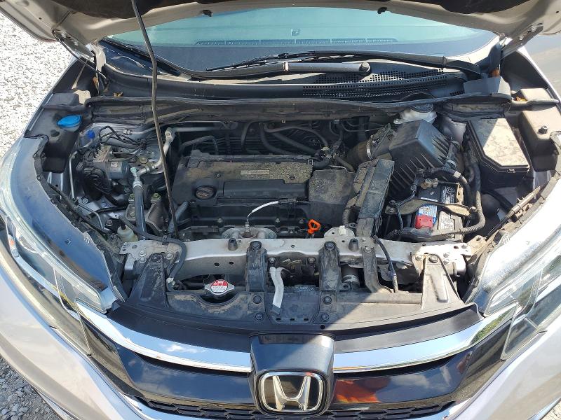 Photo 11 from auction – 2016 HONDA CR-V with VIN 5J6RM4H92GL015463