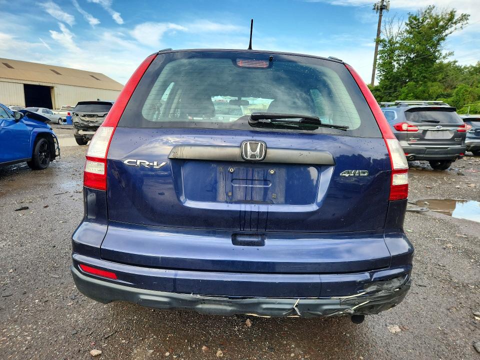 Photo 6 from auction – 2011 HONDA CR-V with VIN 5J6RE4H33BL047131