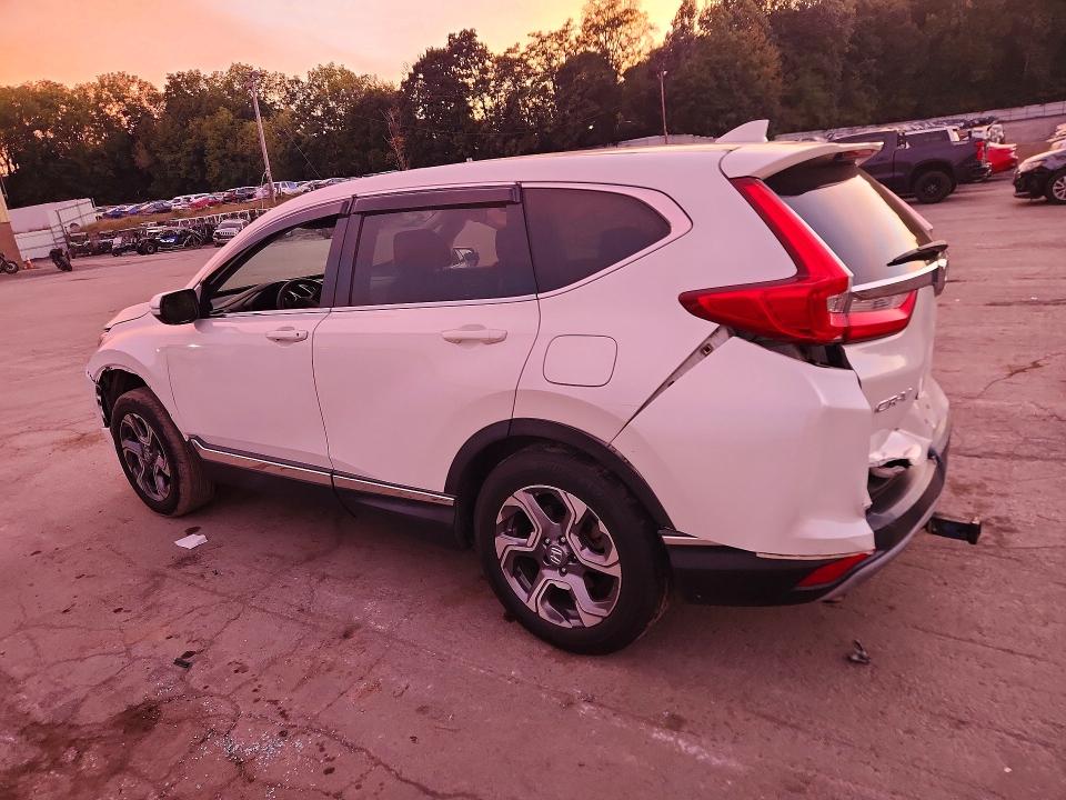 Photo 2 from auction – 2018 HONDA CR-V with VIN 2HKRW2H51JH624928