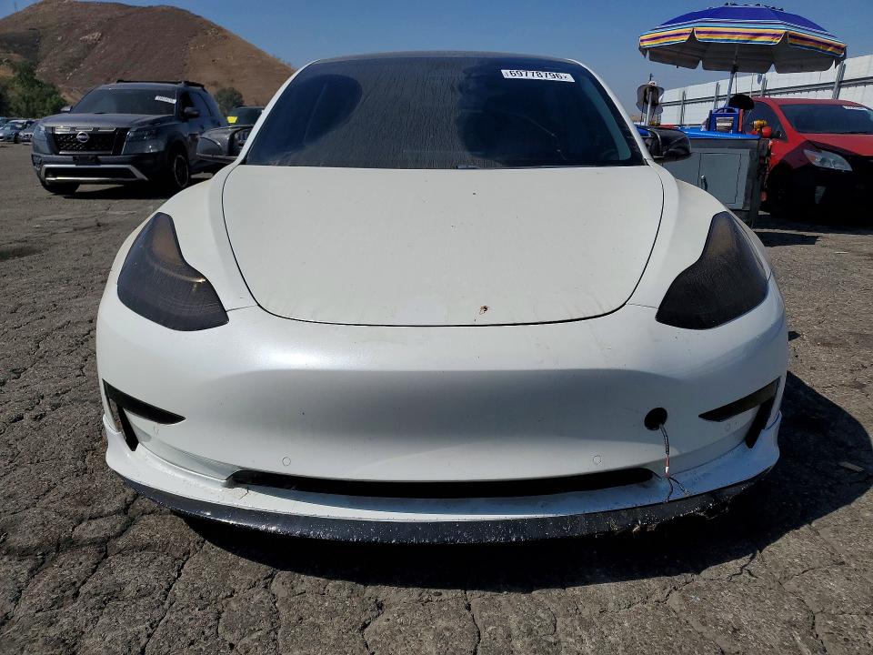 Photo 5 from auction – 2020 TESLA MODEL 3 with VIN 5YJ3E1EC1LF714233