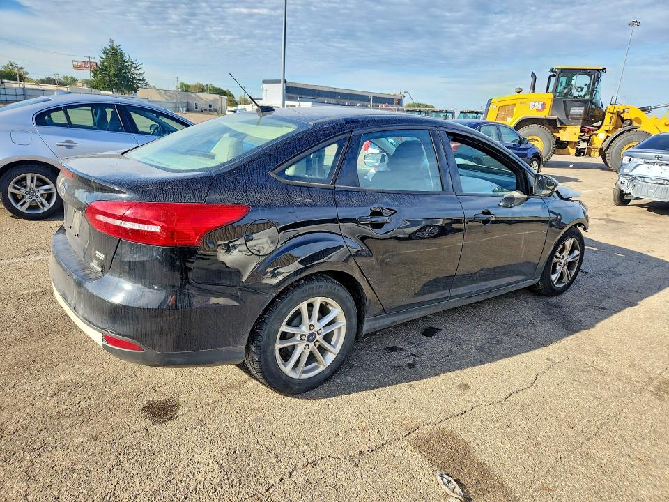Фото 3 с аукциона – 2016 FORD FOCUS с VIN 1FADP3F25GL245818