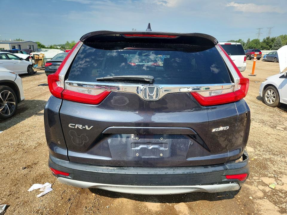 Photo 6 from auction – 2018 HONDA CR-V with VIN 7FARW2H84JE041539