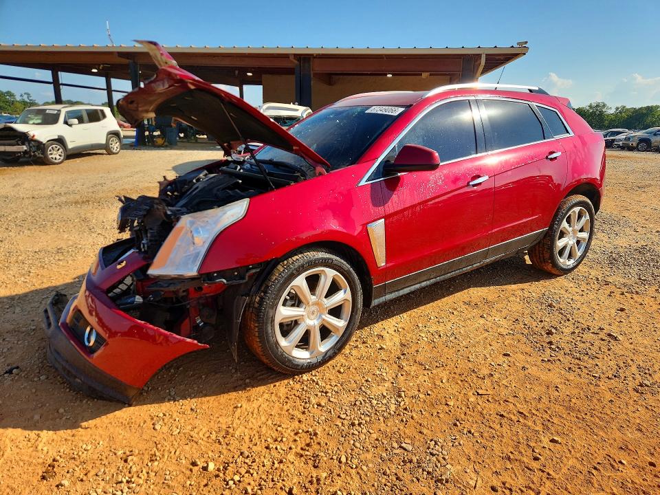 CADILLAC SRX 2014 с VIN 3GYFNDE37ES572196 - Снимка от търг