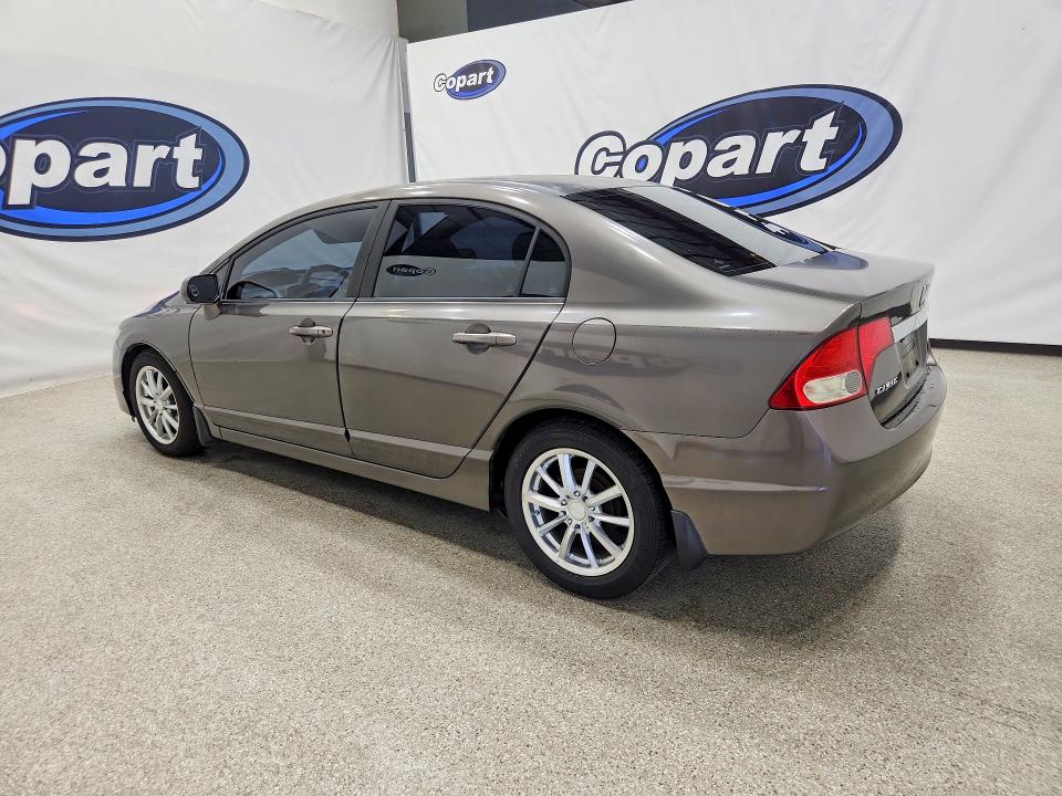 Photo 2 from auction – 2010 HONDA CIVIC with VIN 19XFA1F58AE061718