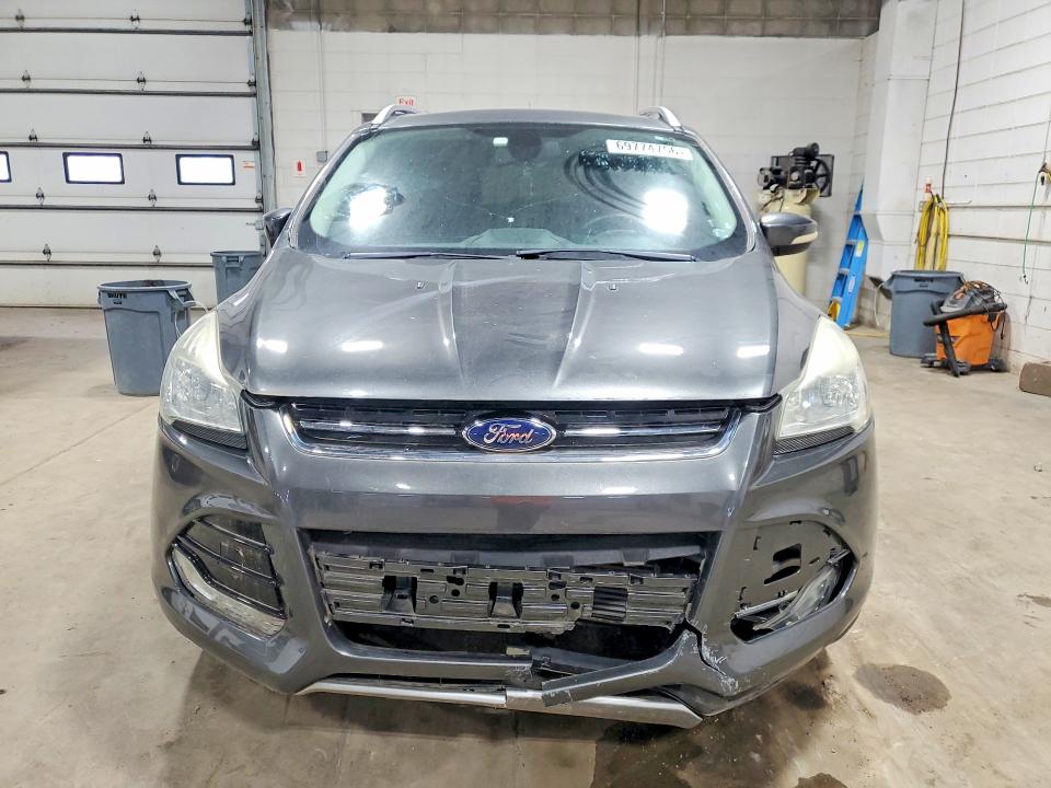 Foto 5 de la subasta – 2015 FORD ESCAPE con VIN 1FMCU9J91FUC35961