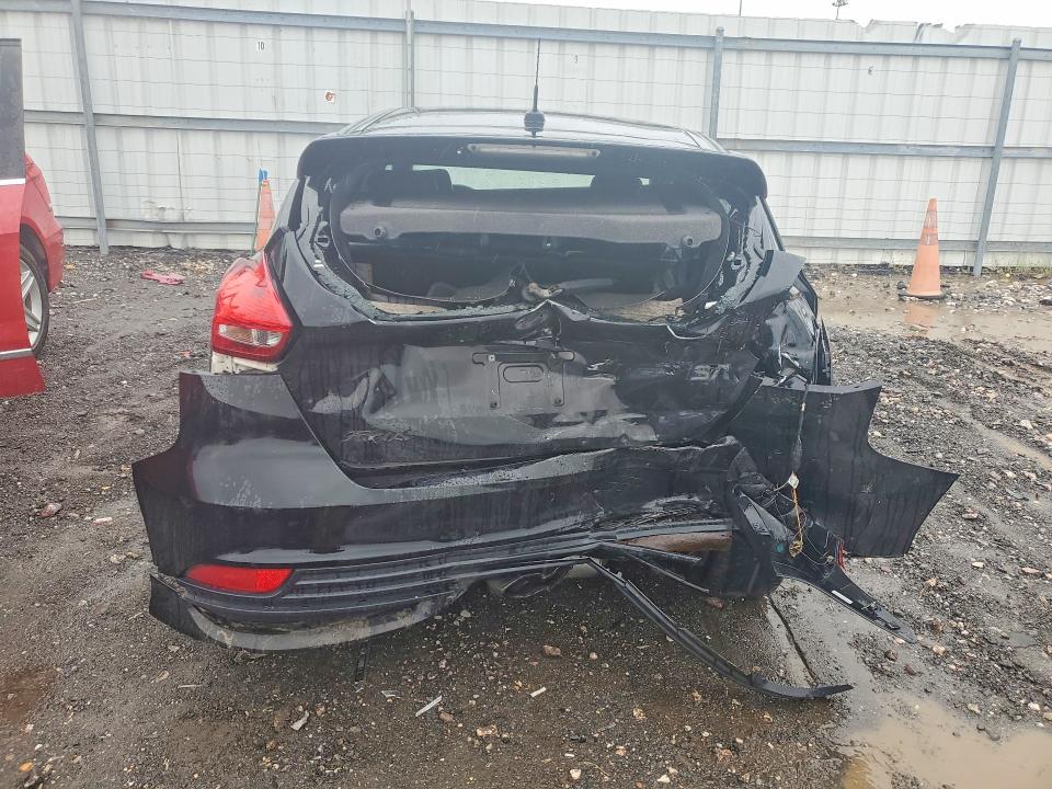 Foto 6 de la subasta – 2016 FORD FOCUS con VIN 1FADP3L92GL343108