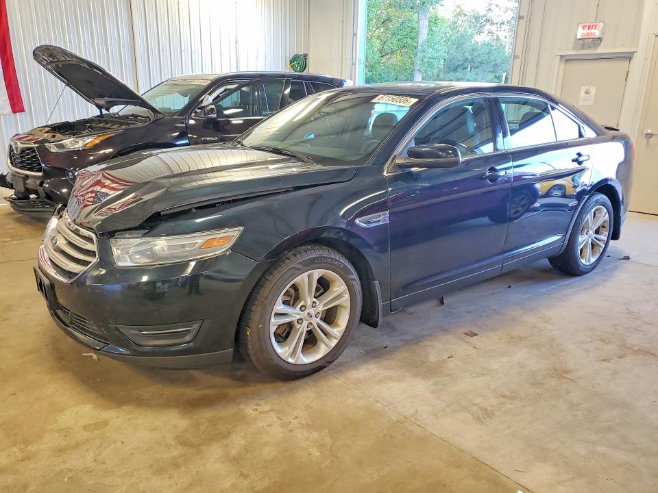 FORD TAURUS 2014 with VIN 1FAHP2E86EG141135 - Photo from auction