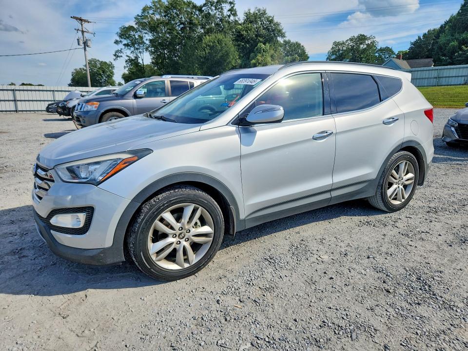Photo 1 from auction – 2014 HYUNDAI SANTA FE with VIN 5XYZU3LA4EG181705
