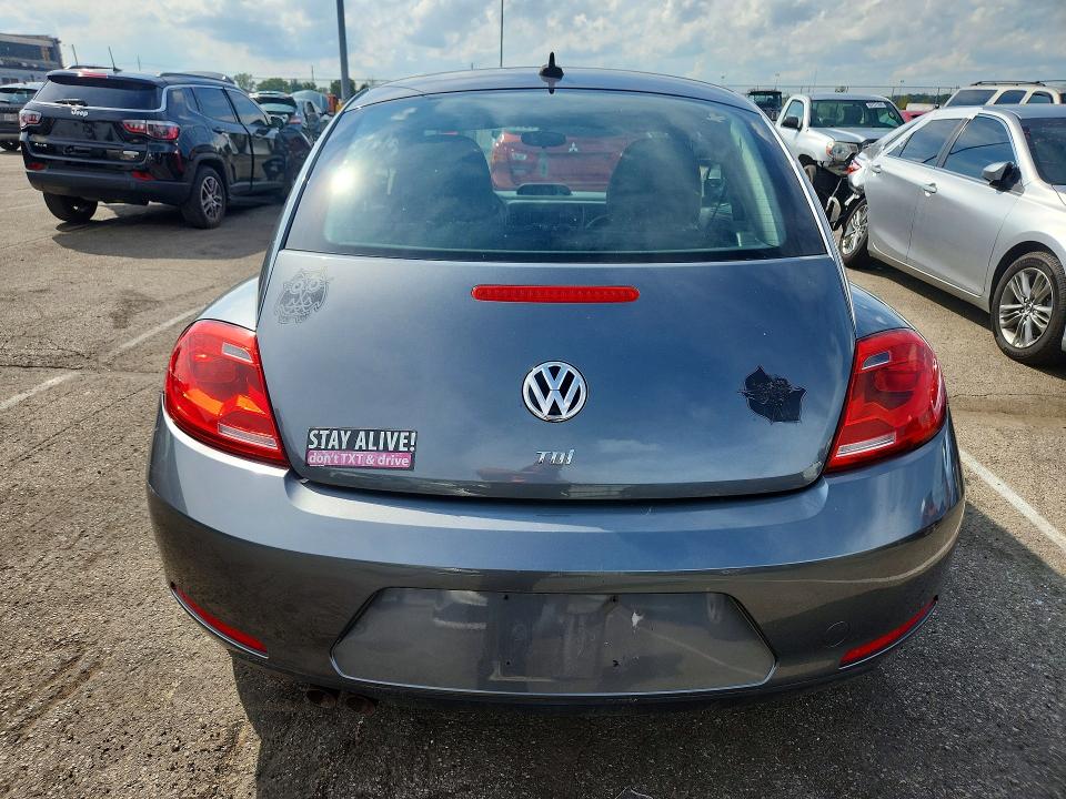 Photo 6 from auction – 2014 VOLKSWAGEN BEETLE with VIN 3VWJL7AT7EM647400