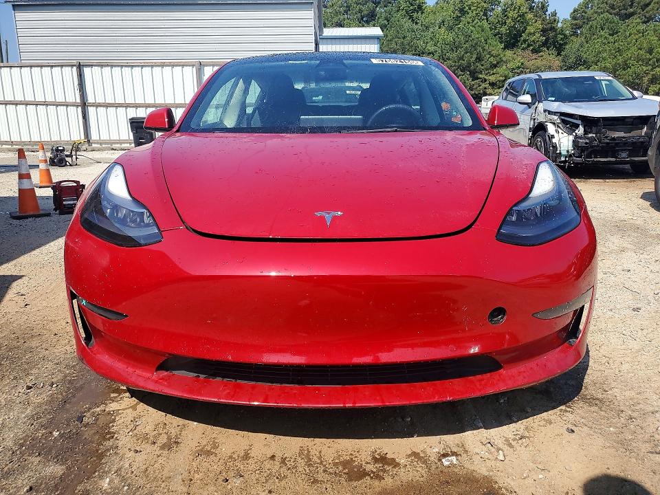 Photo 5 from auction – 2022 TESLA MODEL 3 with VIN 5YJ3E1EAXNF371309
