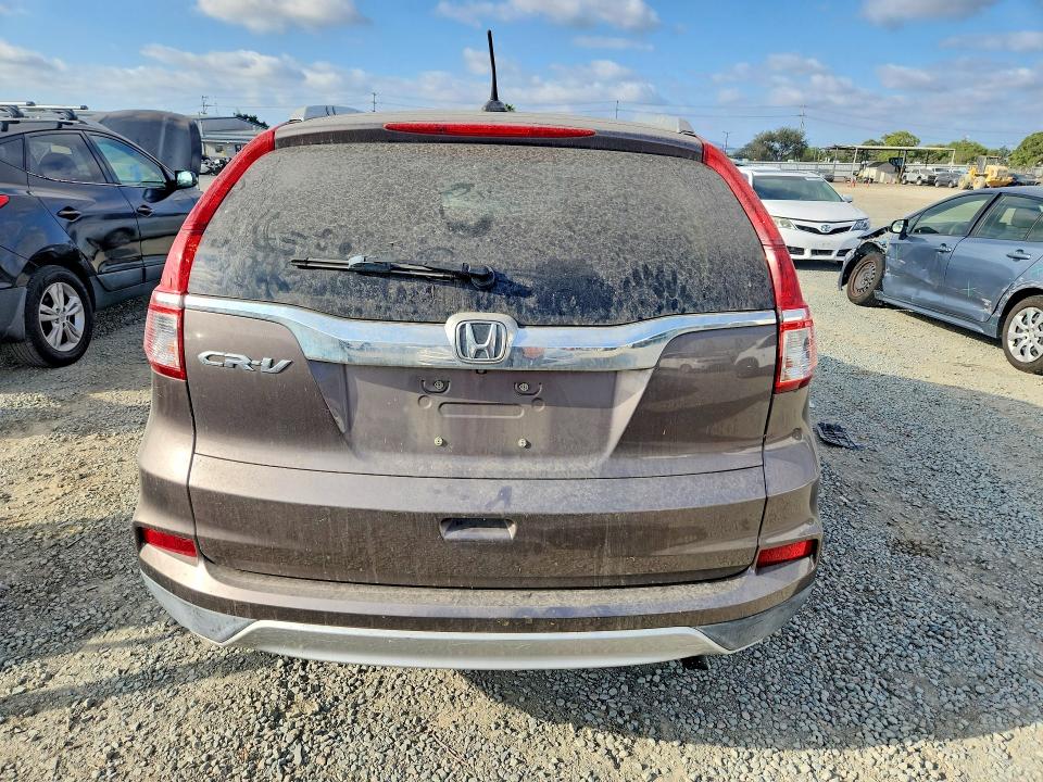 Photo 6 from auction – 2015 HONDA CR-V with VIN 2HKRM3H79FH557466