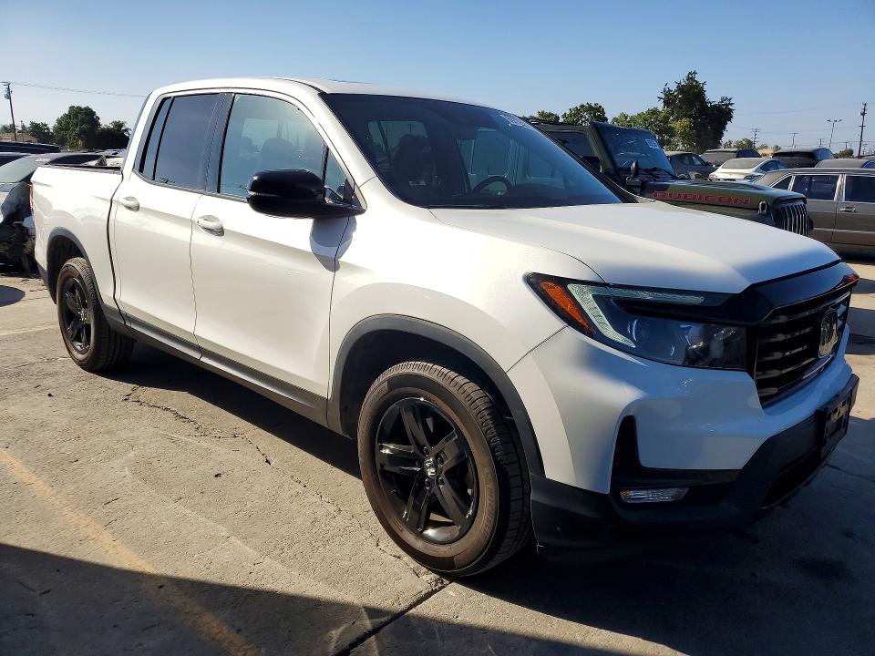 Photo 4 from auction – 2022 HONDA RIDGELINE with VIN 5FPYK3F87NB027045