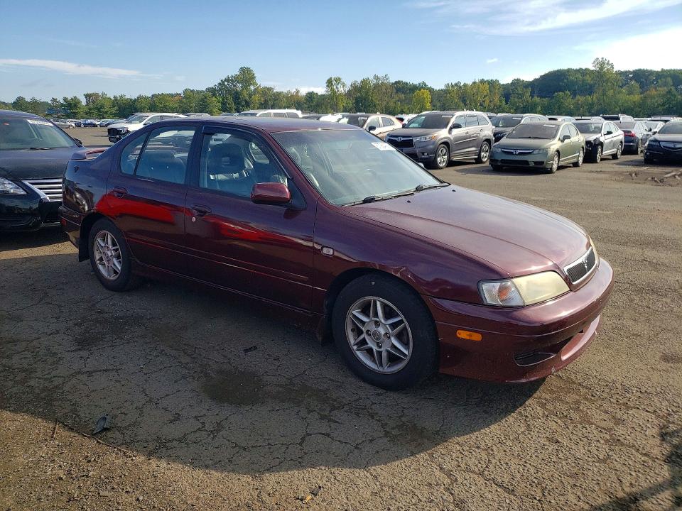 Photo 4 from auction – 2002 INFINITI G20 with VIN JNKCP11A22T505284
