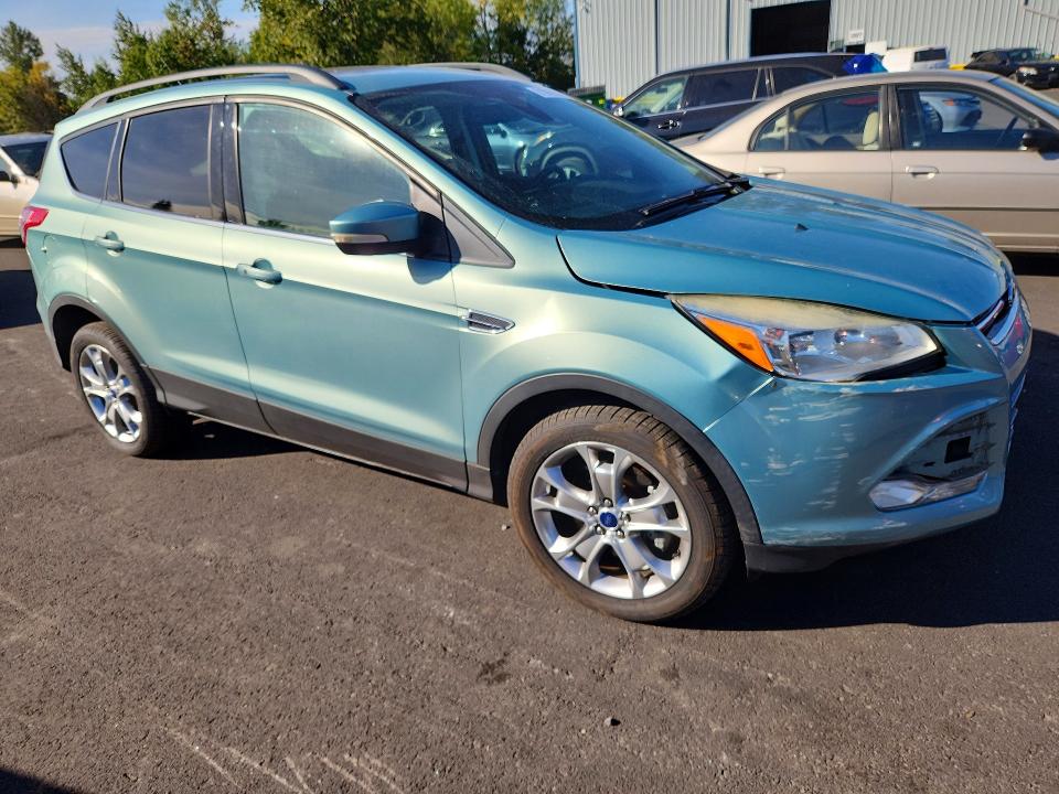 Photo 4 from auction – 2013 FORD ESCAPE with VIN 1FMCU9H98DUD39950
