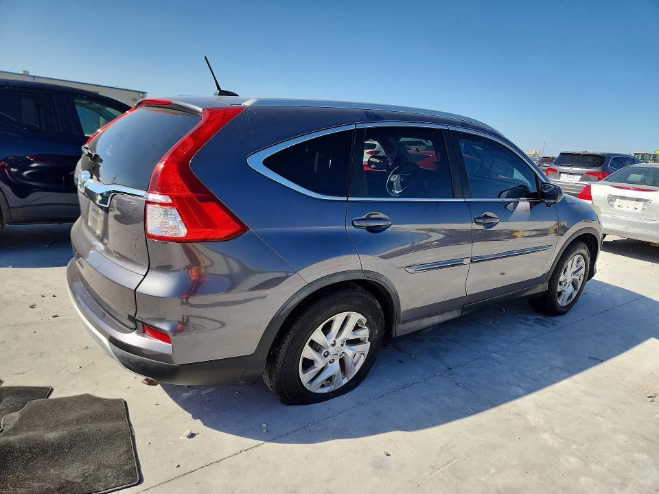 Photo 3 from auction – 2015 HONDA CR-V with VIN 2HKRM3H76FH525848