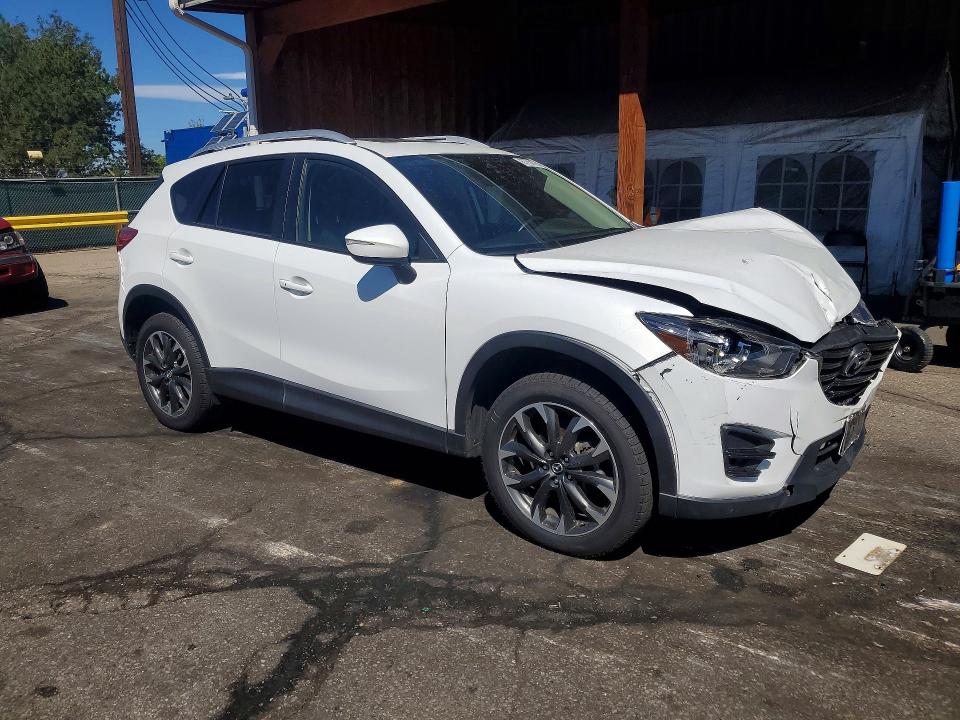 Photo 4 from auction – 2016 MAZDA CX-5 with VIN JM3KE4DY8G0917397