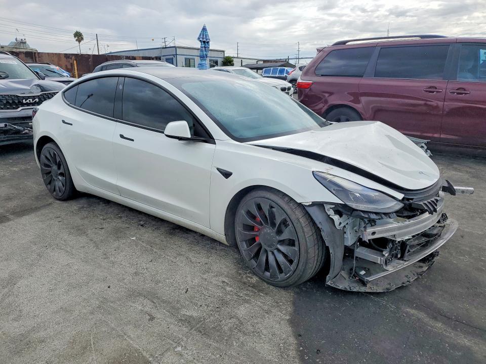 Photo 4 from auction – 2022 TESLA MODEL 3 with VIN 5YJ3E1EC9NF239434