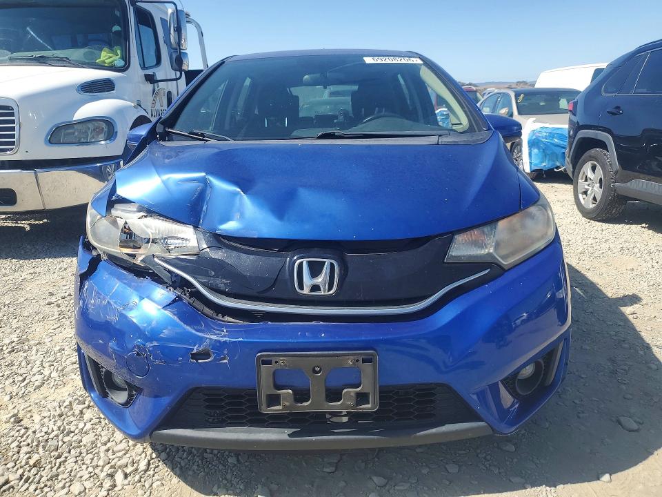 Снимка 5 от търг – 2016 HONDA FIT с VIN JHMGK5H7XGX033580