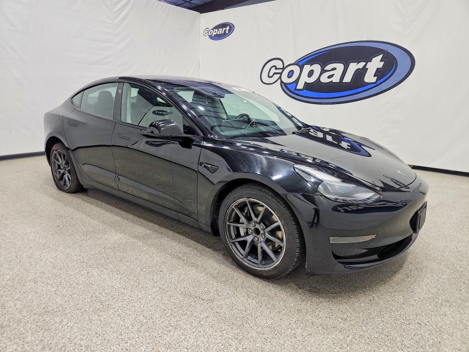 Photo 4 from auction – 2022 TESLA MODEL 3 with VIN 5YJ3E1EA5NF290864