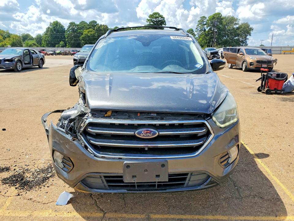 Photo 5 from auction – 2017 FORD ESCAPE with VIN 1FMCU0J98HUA22472