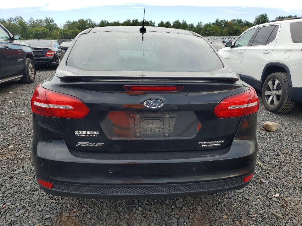 Photo 6 from auction – 2015 FORD FOCUS with VIN 1FADP3J25FL340529