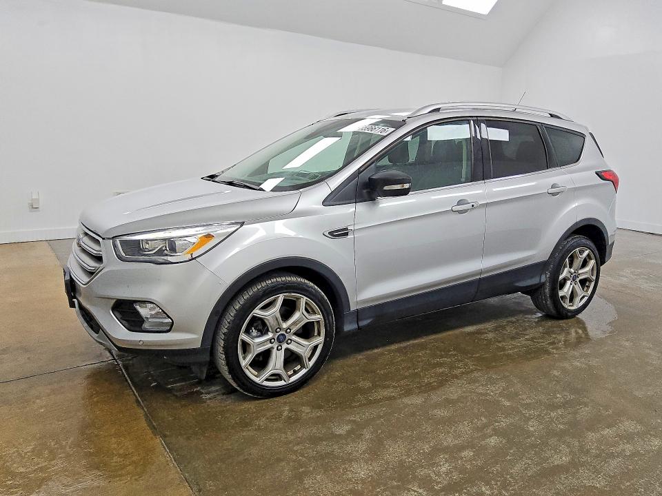 FORD ESCAPE 2019 with VIN 1FMCU0J95KUA56473 - Photo from auction