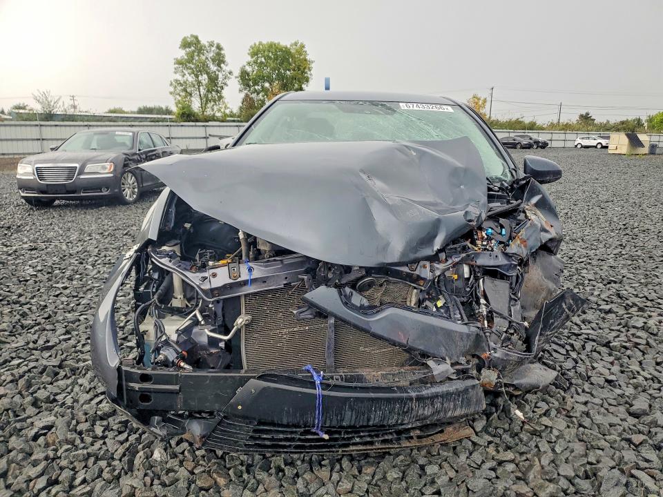 Photo 5 from auction – 2014 TOYOTA COROLLA with VIN 2T1BURHE4EC119703