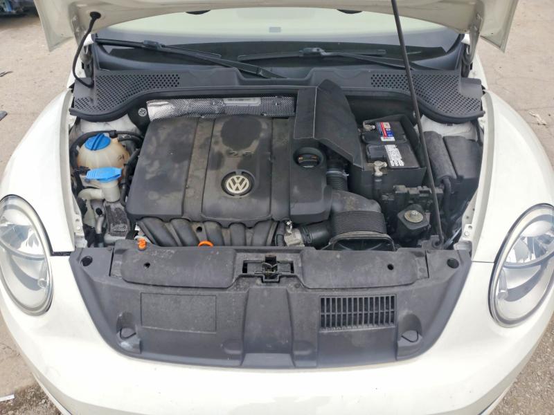 Photo 11 from auction – 2013 VOLKSWAGEN BEETLE with VIN 3VW5P7AT0DM815897