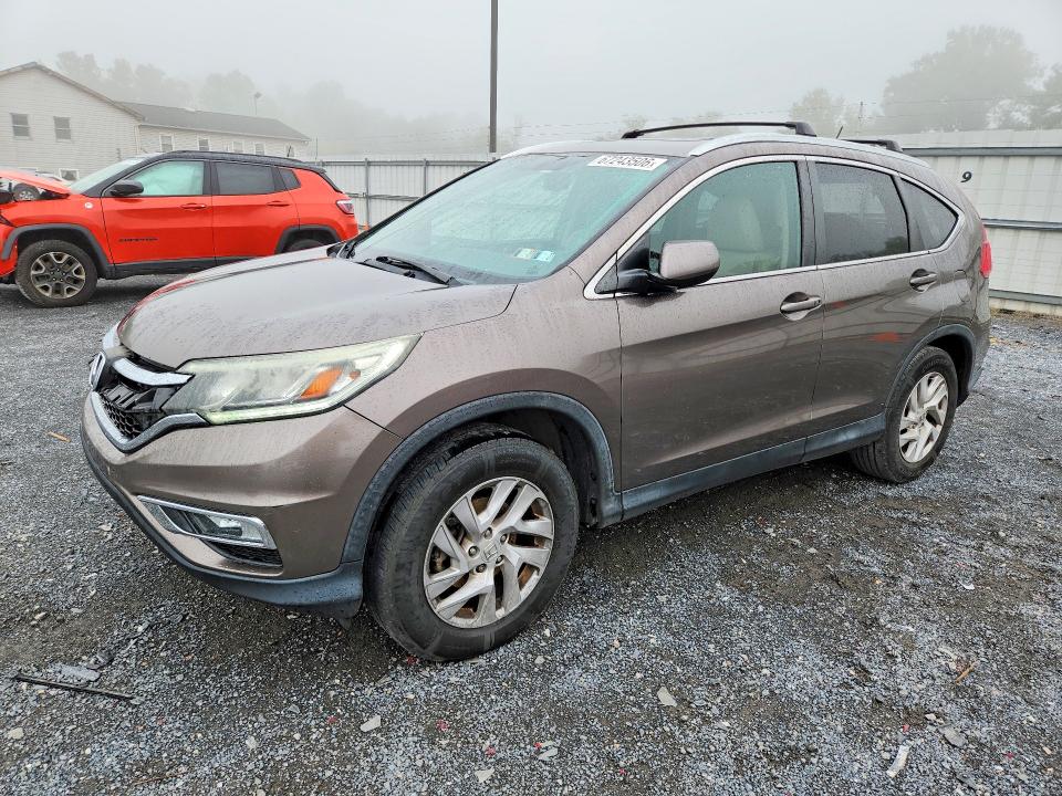 HONDA CR-V 2015 with VIN 2HKRM4H73FH633530 - Photo from auction
