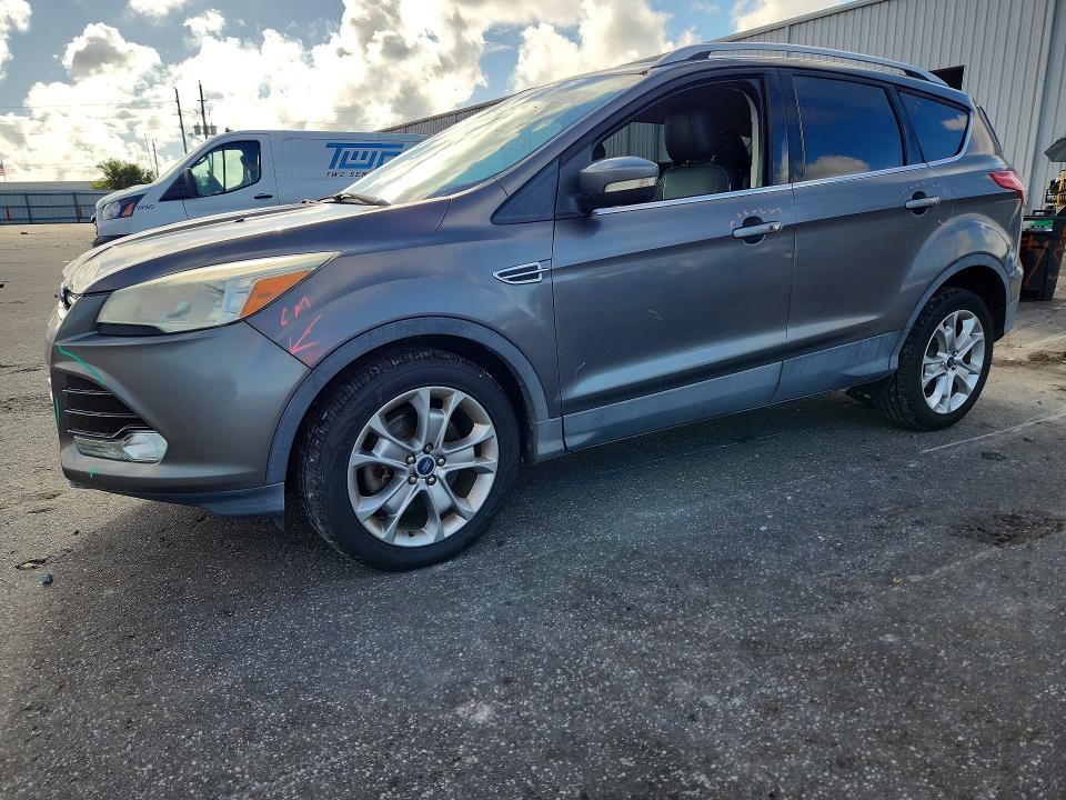 FORD ESCAPE 2014 with VIN 1FMCU0J99EUB23161 - Photo from auction