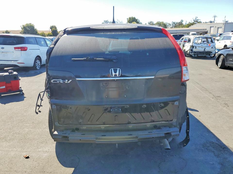 Photo 6 from auction – 2014 HONDA CR-V with VIN 2HKRM3H35EH564944