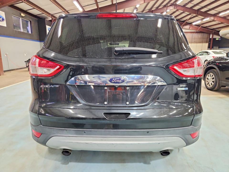 Photo 6 from auction – 2014 FORD ESCAPE with VIN 1FMCU9GX9EUD62171