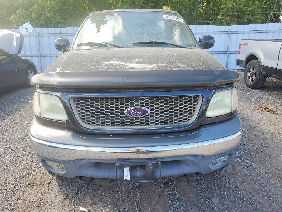 Photo 5 from auction – 2003 FORD F150 with VIN 1FTRW08LX3KD44383