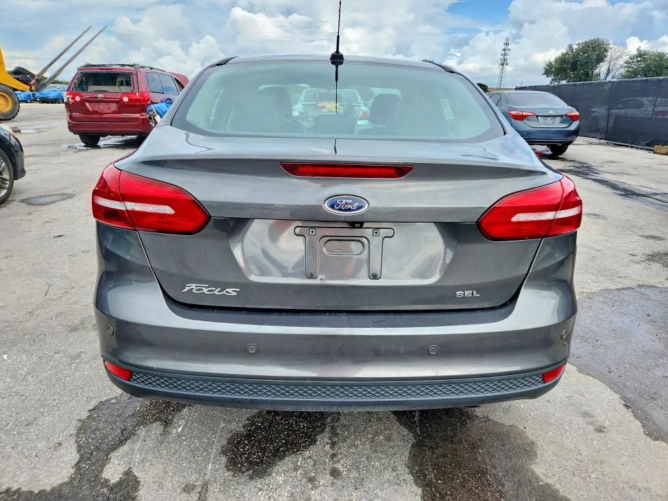 Foto 6 de la subasta – 2017 FORD FOCUS con VIN 1FADP3H22HL218817