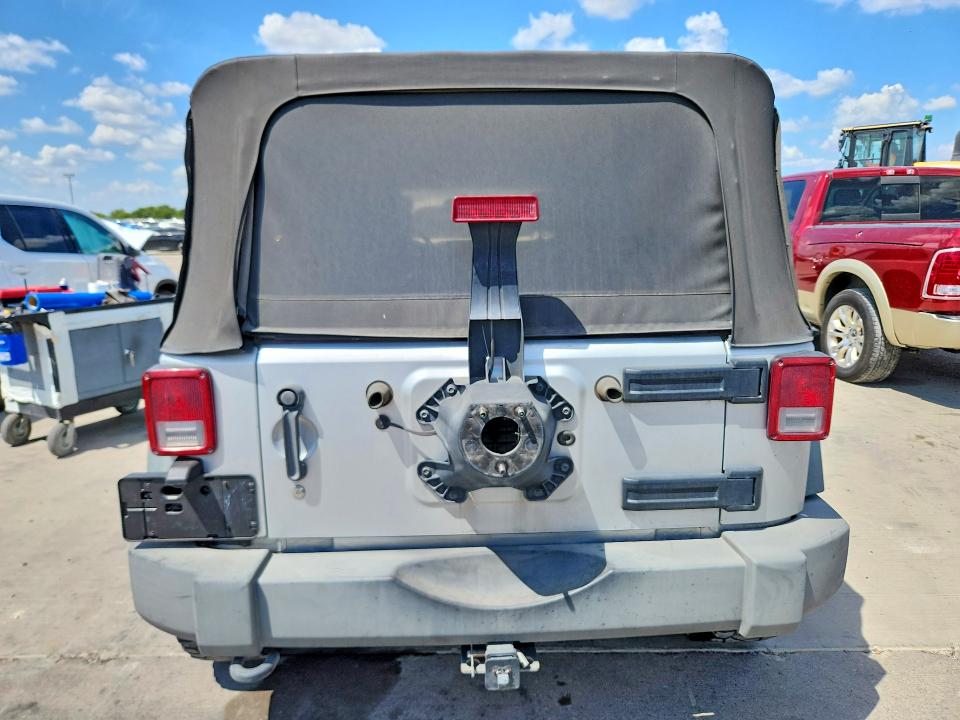 Photo 6 from auction – 2009 JEEP WRANGLER UNLIMITED with VIN 1J4GB39129L742847