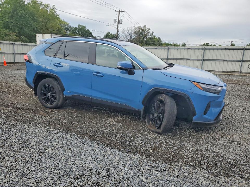Photo 4 from auction – 2023 TOYOTA RAV4 with VIN 4T3T6RFV0PU119062
