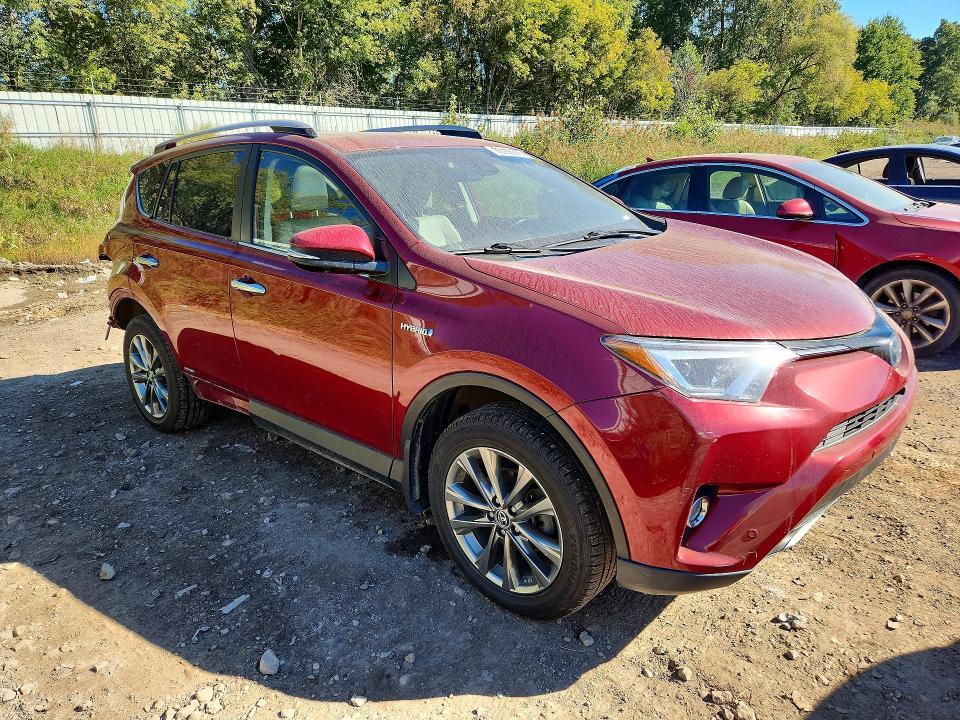 Photo 4 from auction – 2018 TOYOTA RAV4 HV with VIN JTMDJREV6JD224312