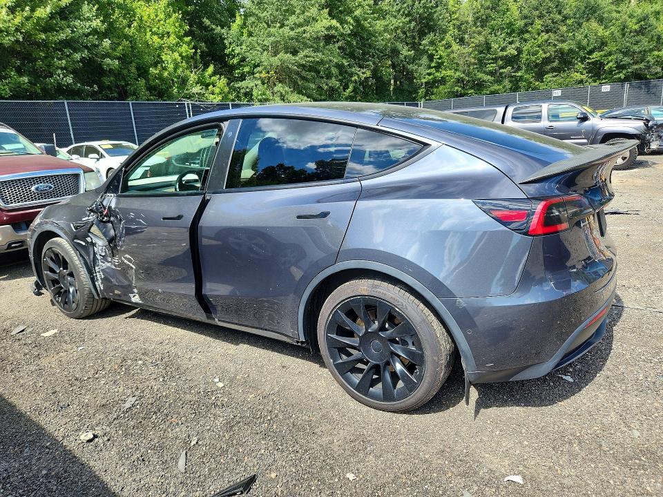 Photo 2 from auction – 2021 TESLA MODEL Y with VIN 5YJYGDED9MF134434